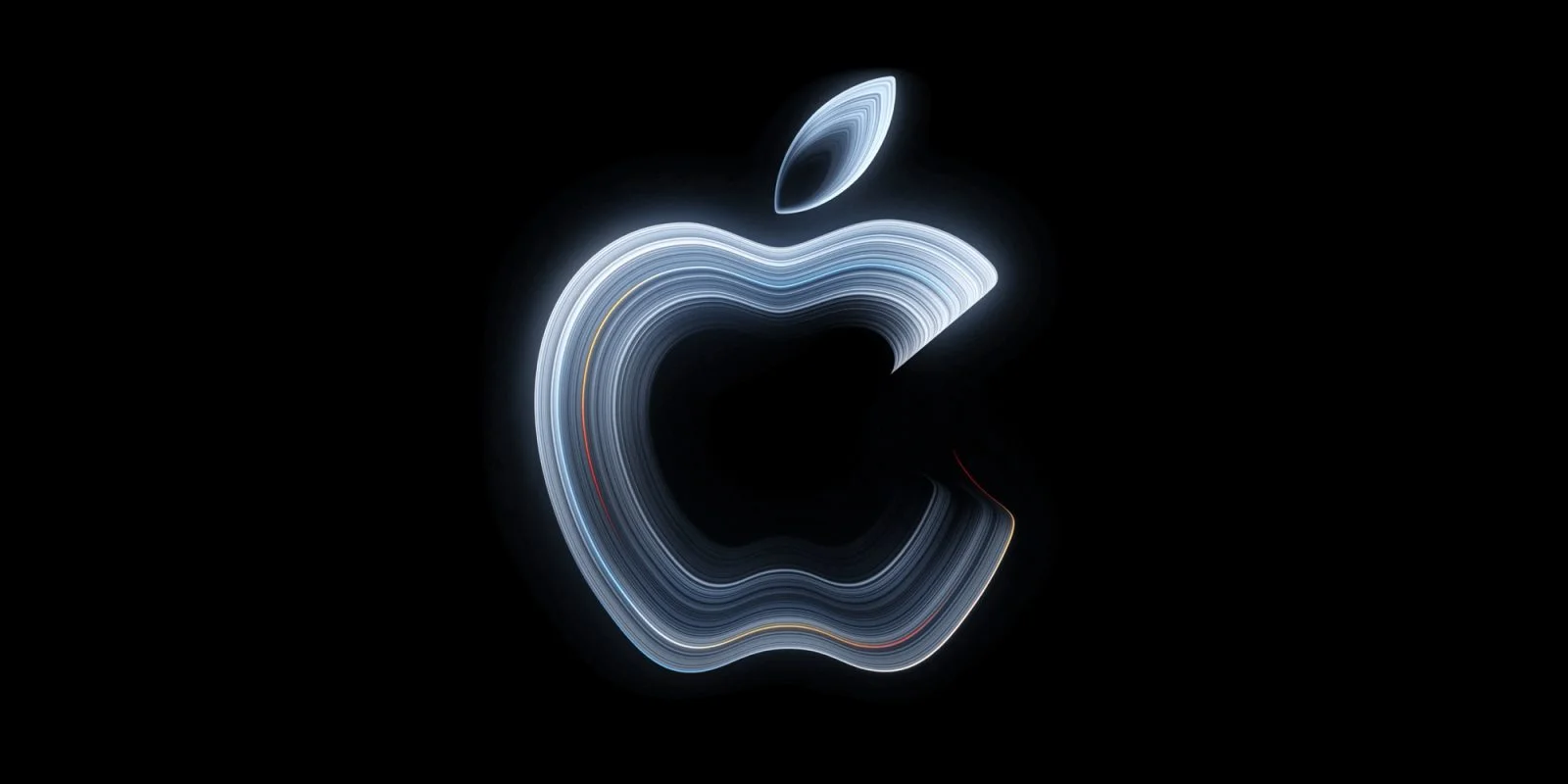Arte do convite da Apple para o evento Pro and tell, com a maçã em linhas luminosas sobre fundo preto